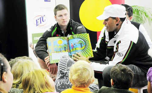 South Cares ambassador David Peachey and former Rabbitohs team-mate Chris McQueen helping kids to mark NAIDOC Week. South Cares ambassador David Peachey and former Rabbitohs team-mate Chris McQueen helping kids to mark NAIDOC Week.
